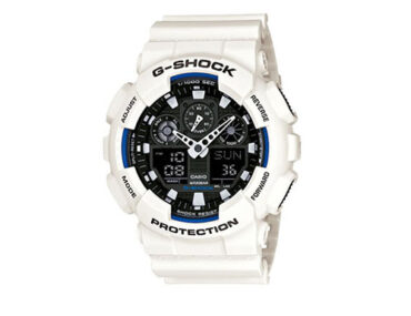 Relógio Casio G-SHOCK GA-100B-7ADR branco com detalhes azuis, mostrador analógico-digital e pulseira de borracha branca, vista frontal